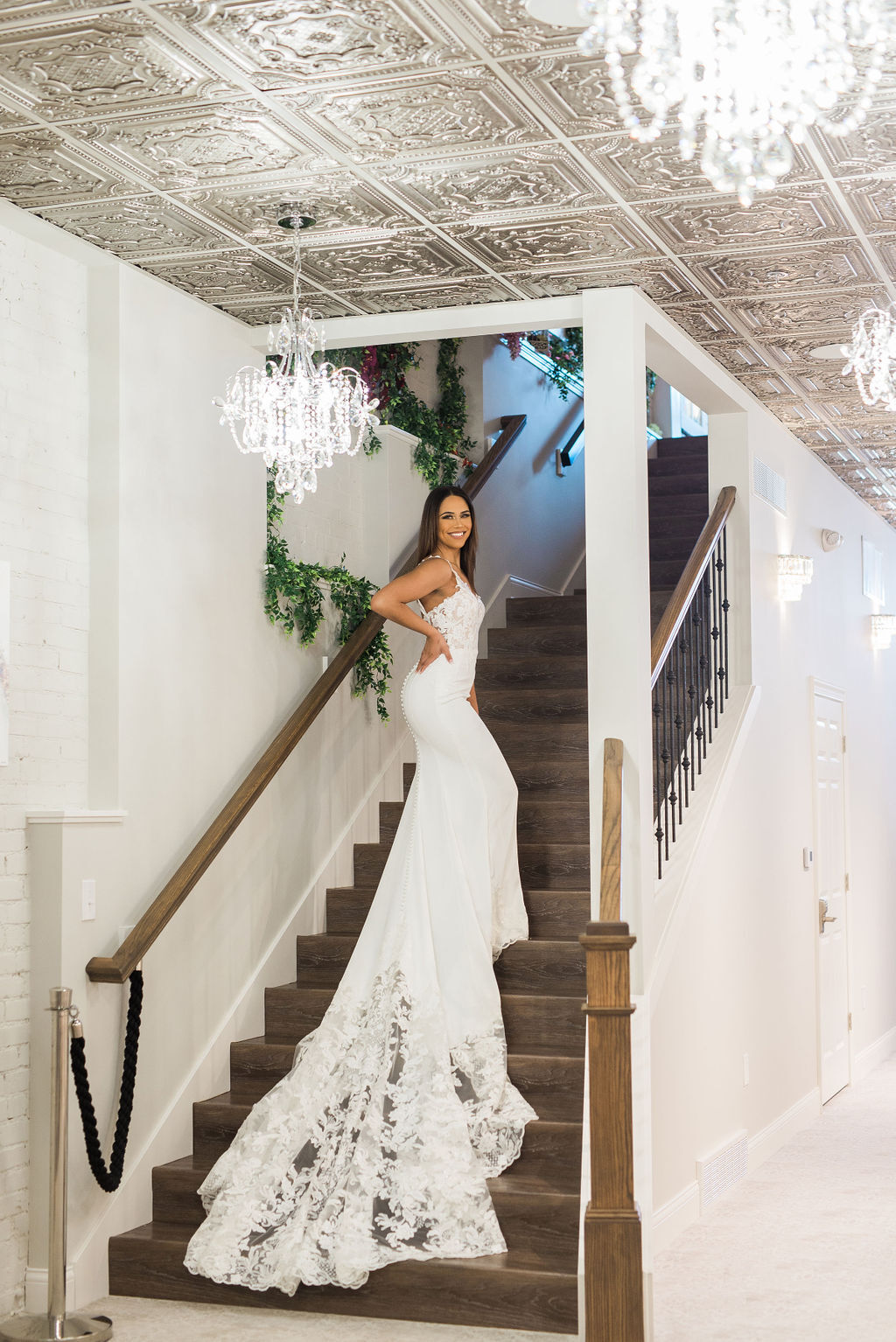 Model wearing a bridal dress on the stairs